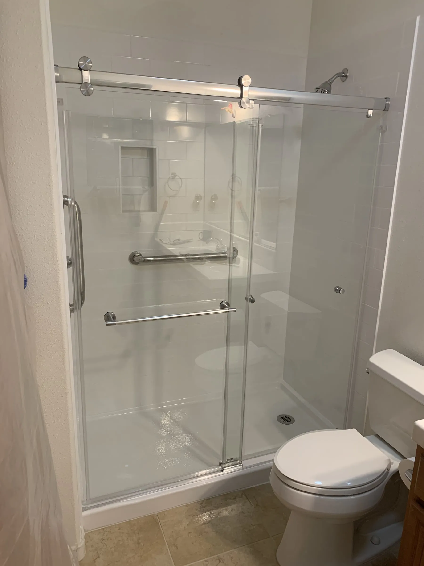 White tile walk-in shower: Finished with glass door